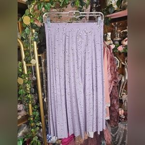 A beautiful lavender or lilac skirt, new tags beautiful For the springtime.